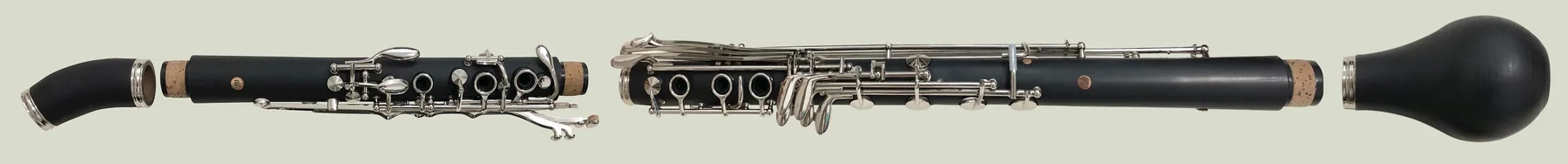 Disassembled clarinet showing its different parts Disassembled clarinet showing its different parts