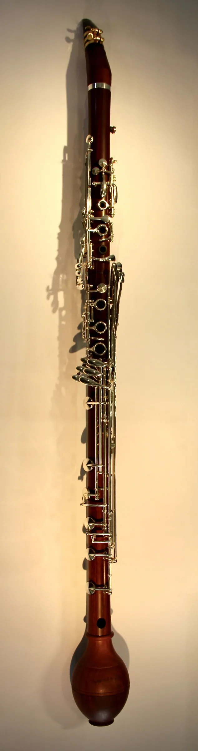 Wooden clarinet with silver keys Wooden clarinet with silver keys