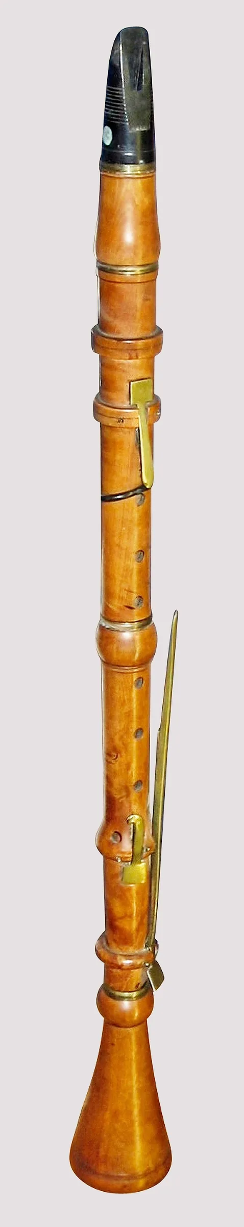 Antique wooden clarinet with metal keys Antique wooden clarinet with metal keys