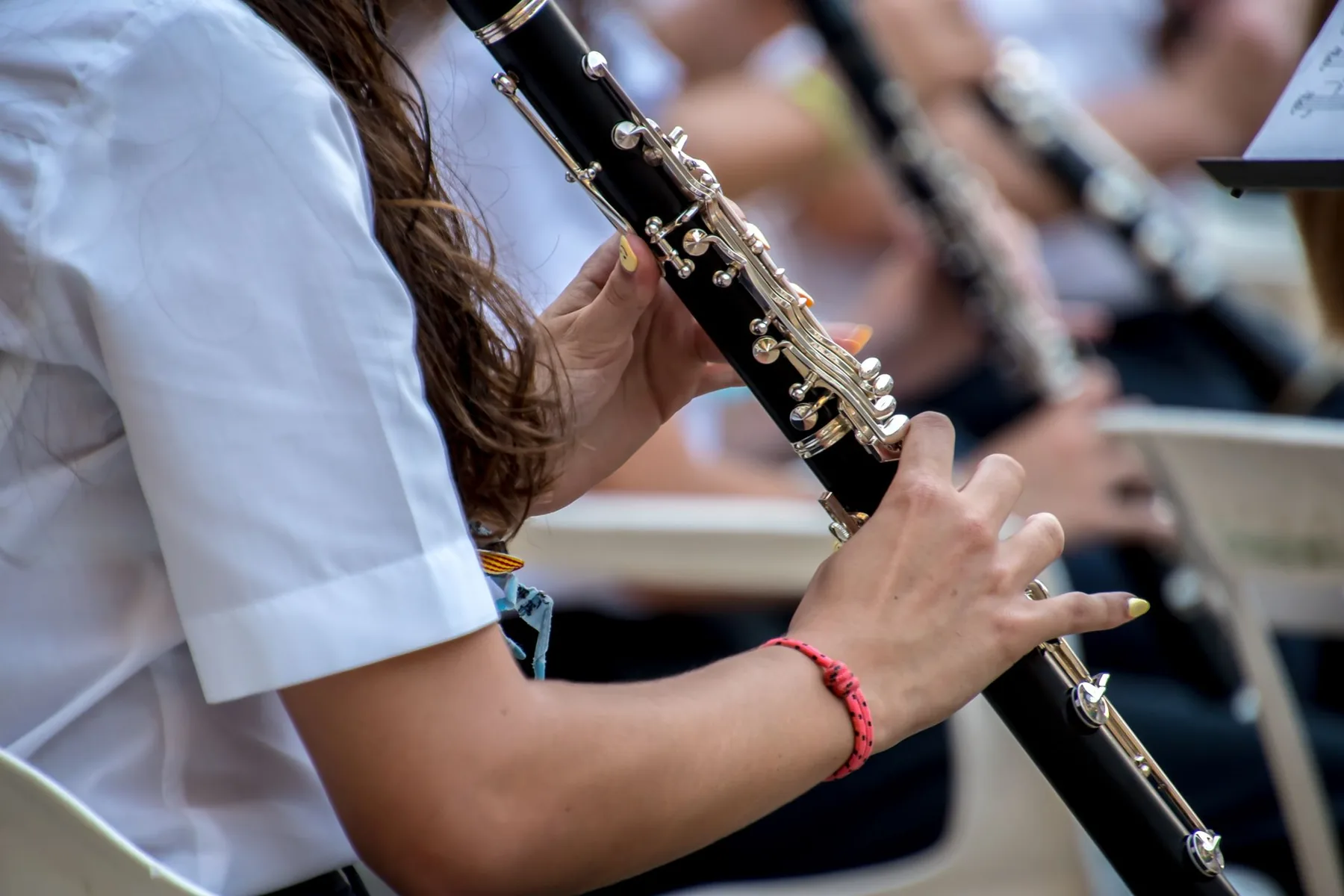 Close-up of hands on a clarinet Close-up of hands on a clarinet