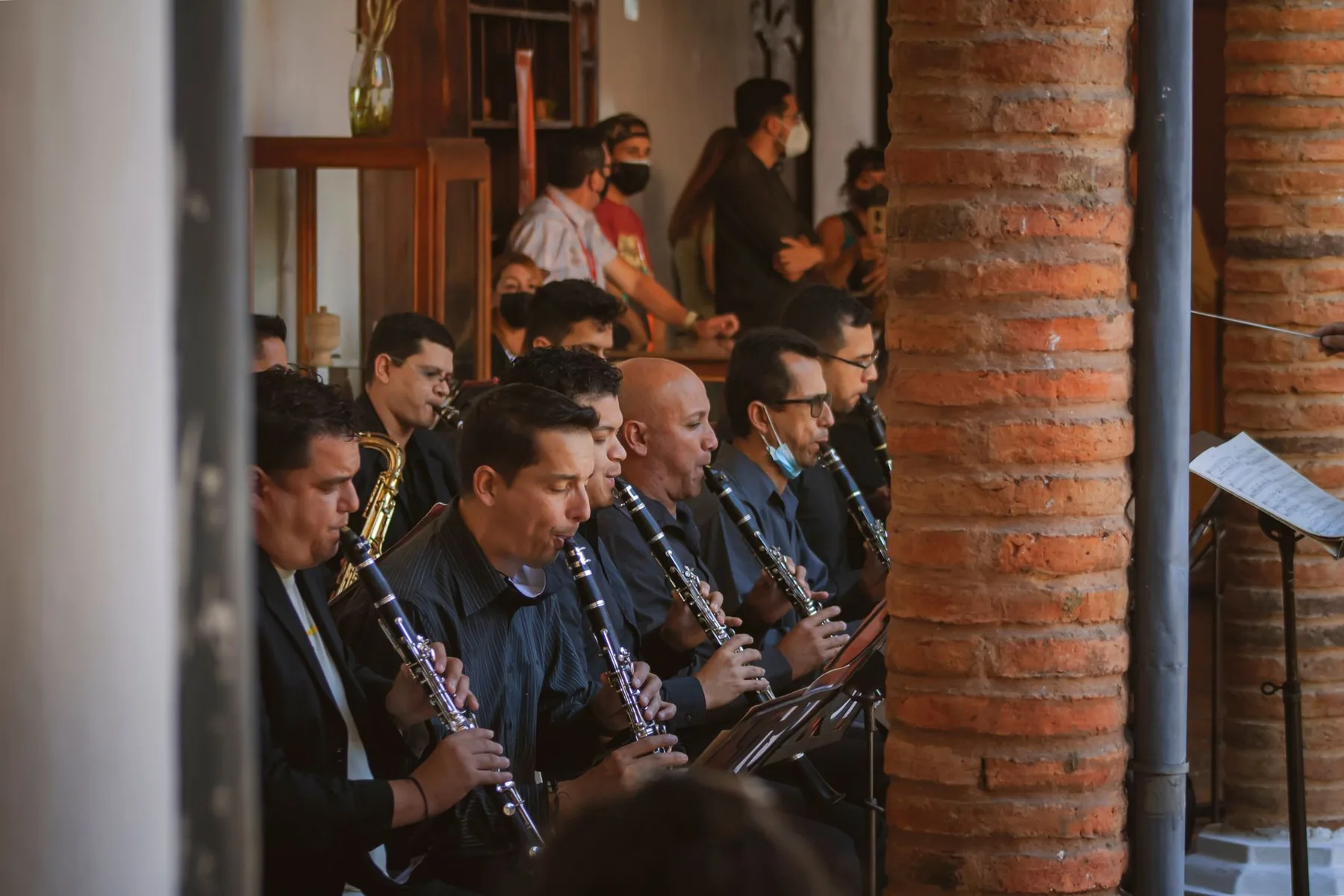 Ensemble of clarinetists playing from sheet music Ensemble of clarinetists playing from sheet music