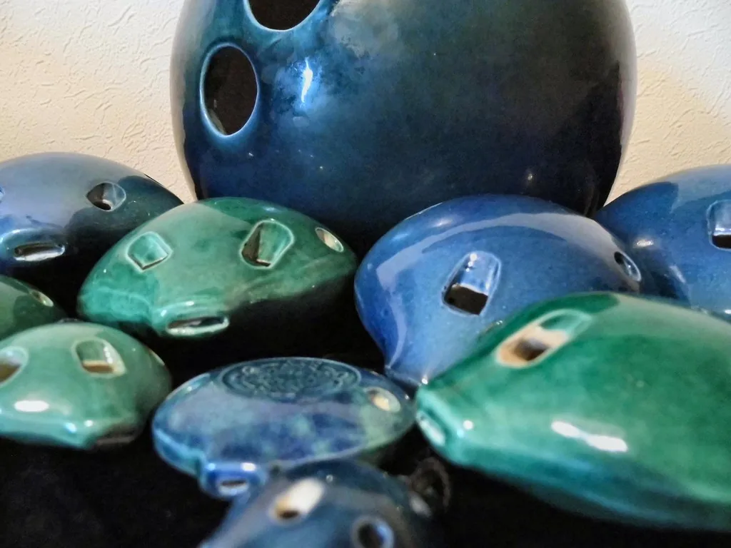 Blue and green glazed ceramic ocarinas Blue and green glazed ceramic ocarinas